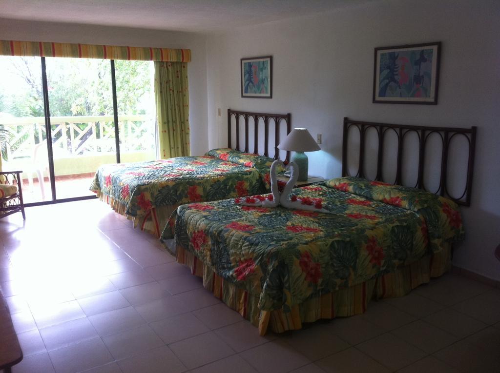 อีโมชั่น บาย โอเดลปา - ปลายา โดราดา Hotel Puerto Plata ห้อง รูปภาพ