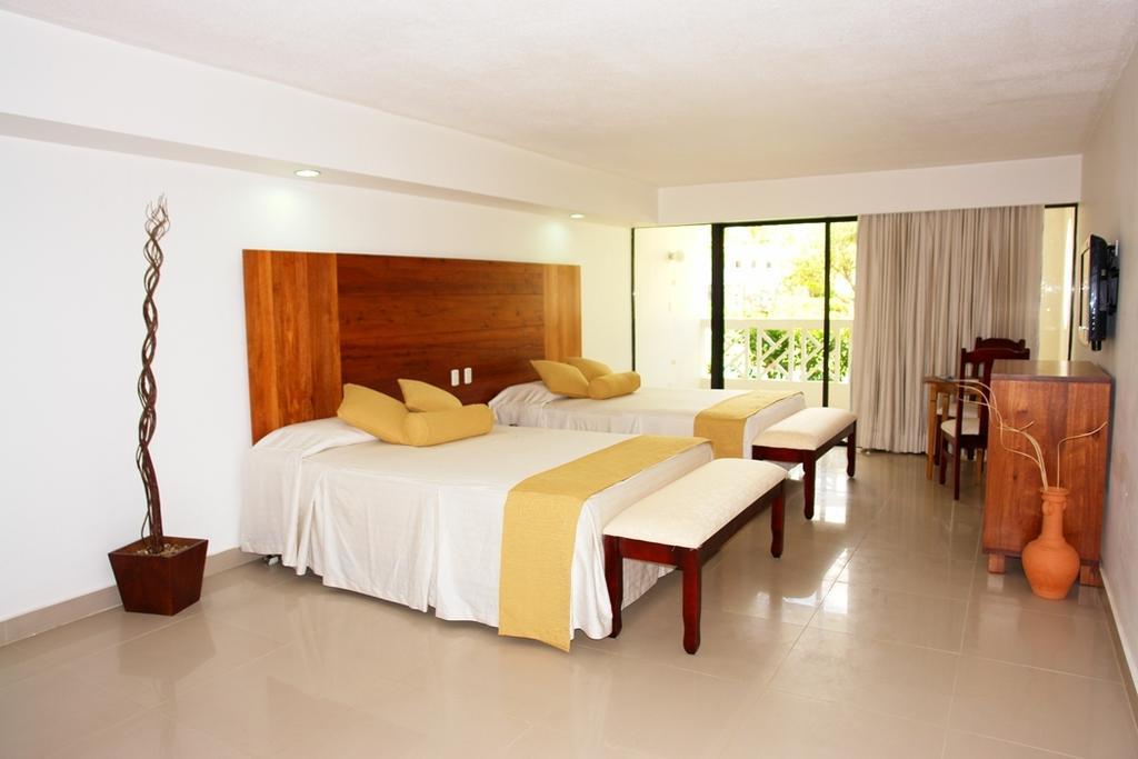 อีโมชั่น บาย โอเดลปา - ปลายา โดราดา Hotel Puerto Plata ห้อง รูปภาพ